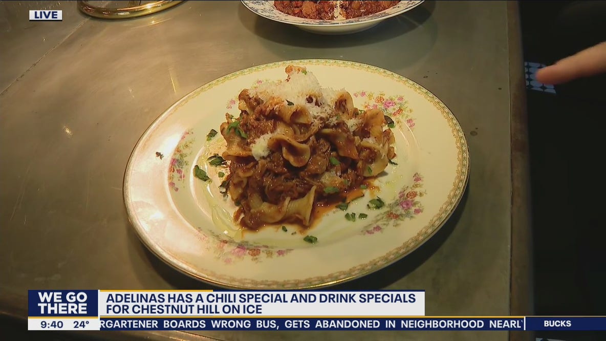 Jenn gets a look at the menu at Adelinas in Chesnut Hill